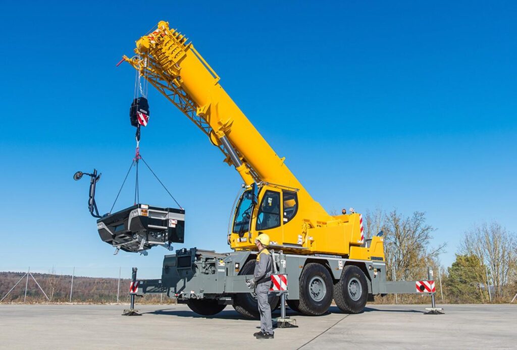 How do the functions of hydraulic systems differ across various types of construction machinery? qzj